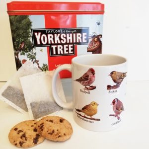 pictures of British Finches on a white ceramic mug